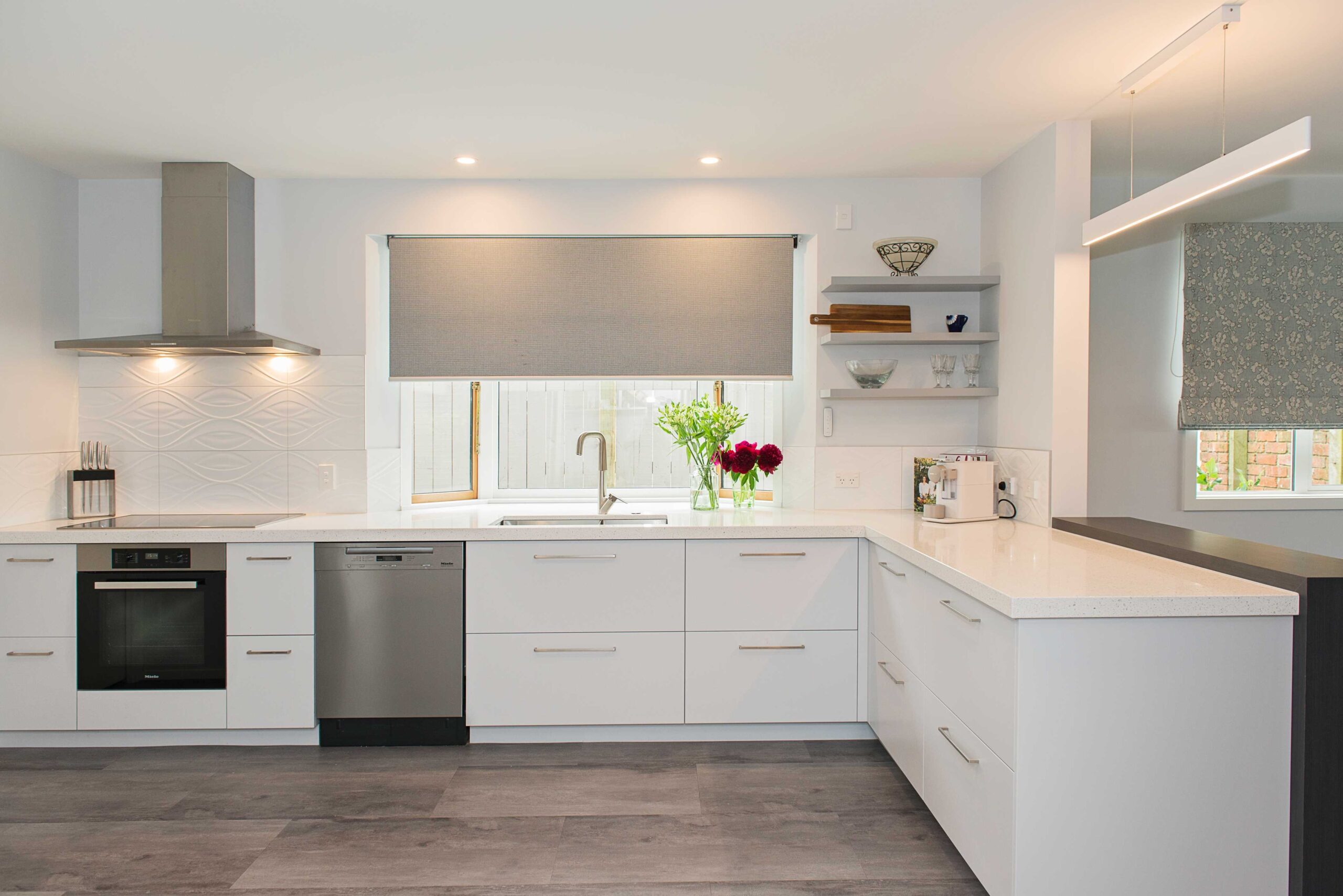  Clean lines and soft colours for this renovated kitchen. (Barrett Joinery)