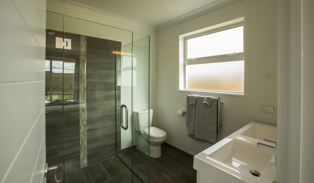 En suite with feature shower tiles 