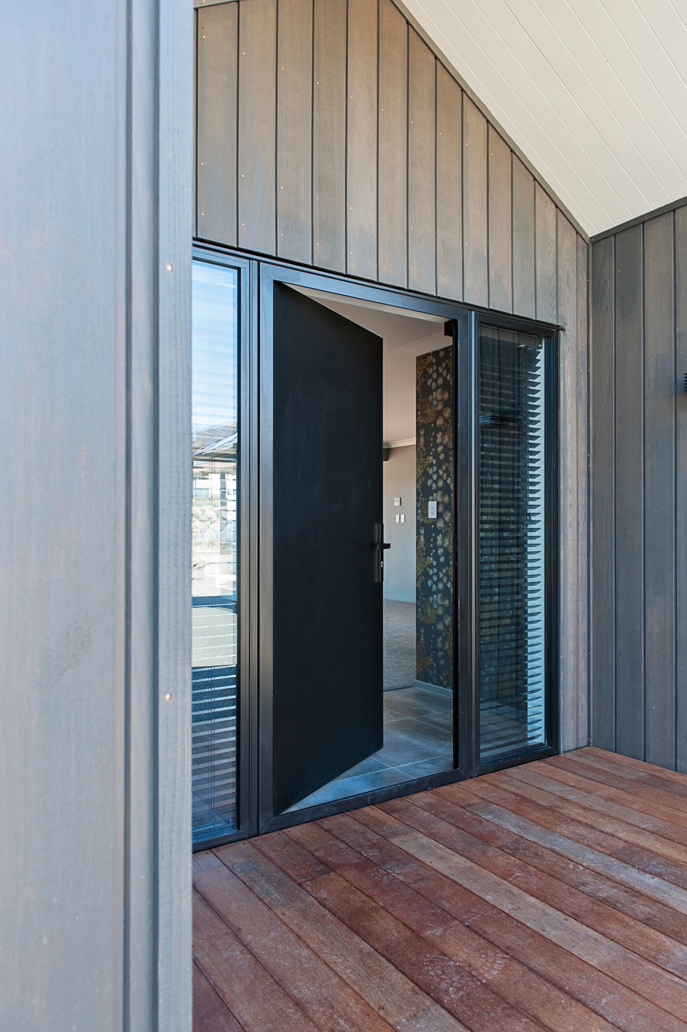  Feature cedar cladding provide a warm welcome to the front door