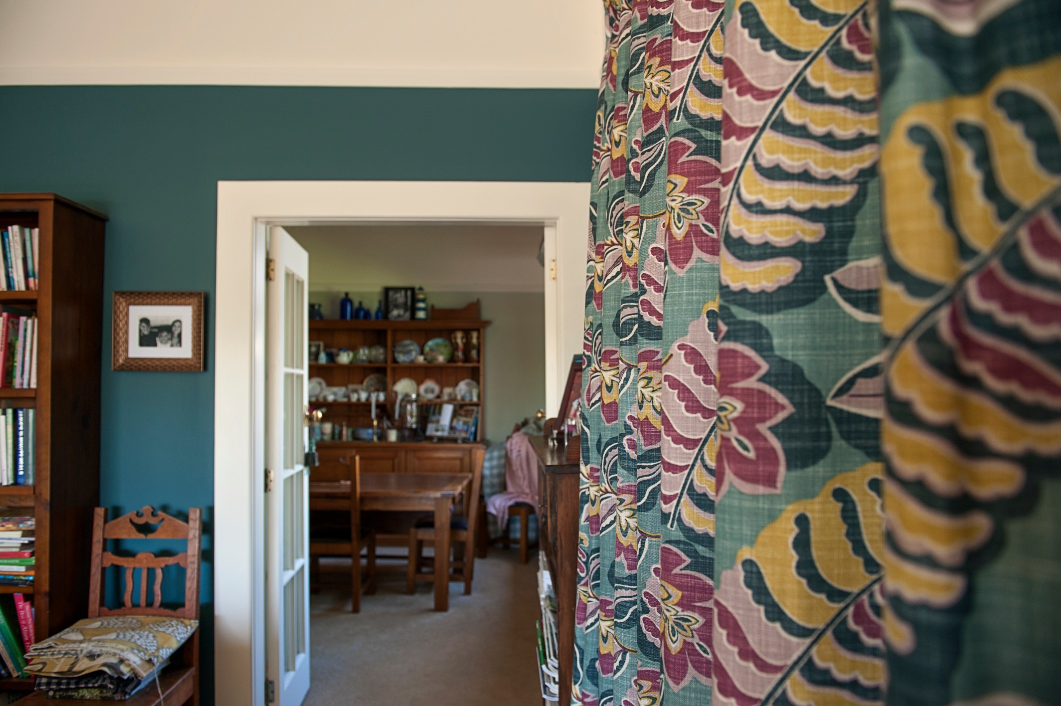  Sanderson curtains enhance the deep walls colour