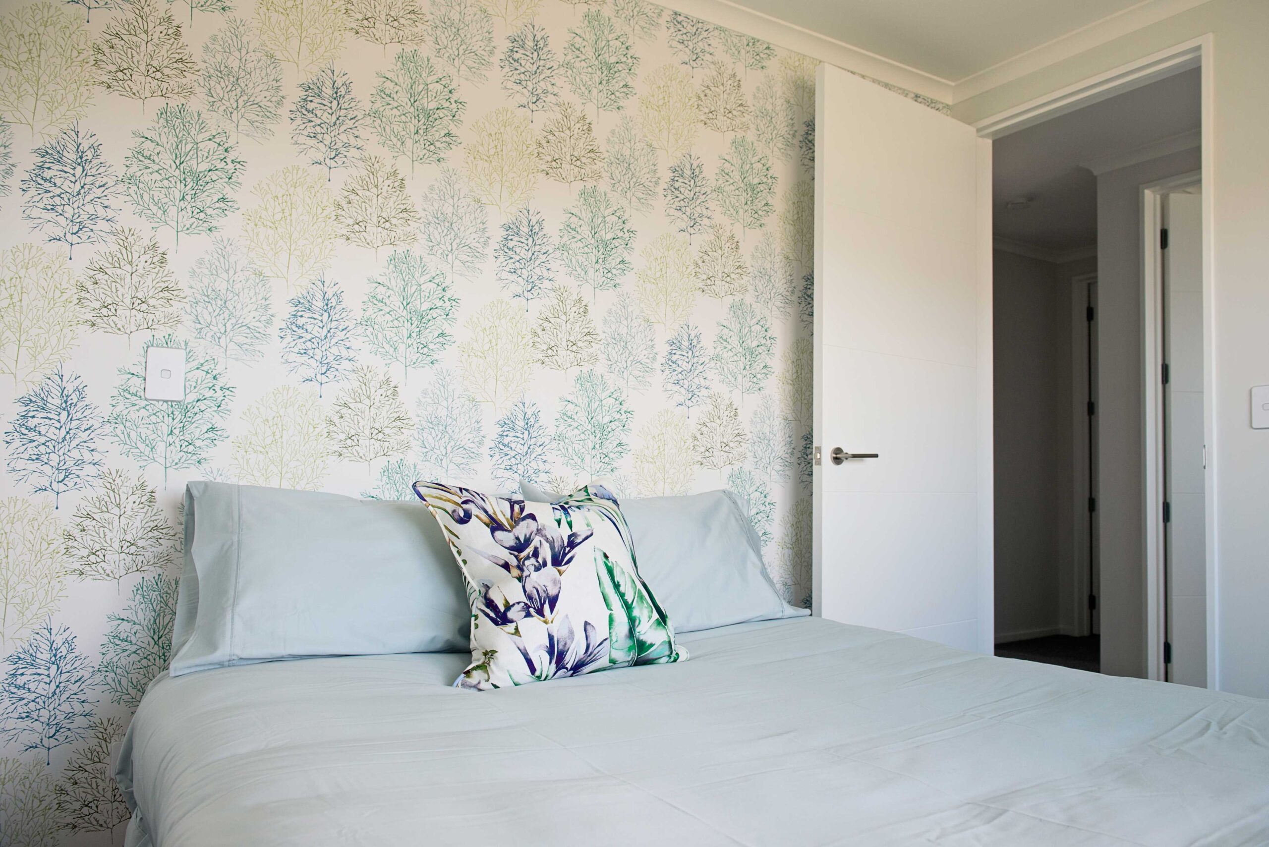  Soft duck egg blues and Scion wallpaper that reflects the alpine trees in Twizel.